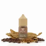 E-liquid bottle labeled 'Bar Juice 5000 Coffee Tobacco' surrounded by coffee beans and dried tobacco leaves on a white background.